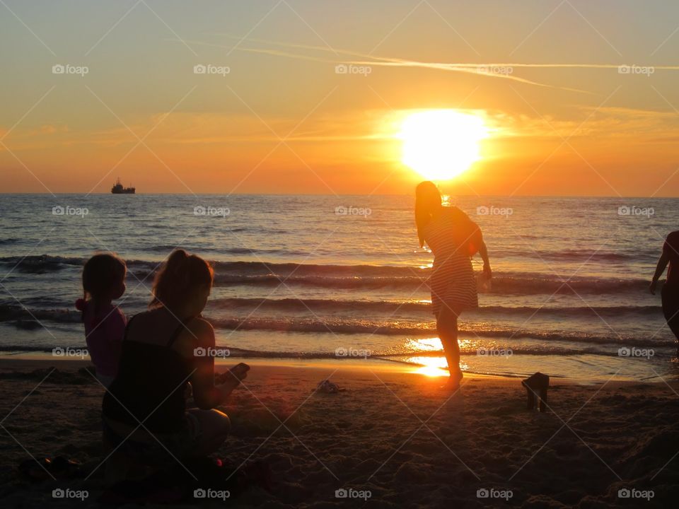 Beautiful moment. Mother and Daughter very happy moment on sunset