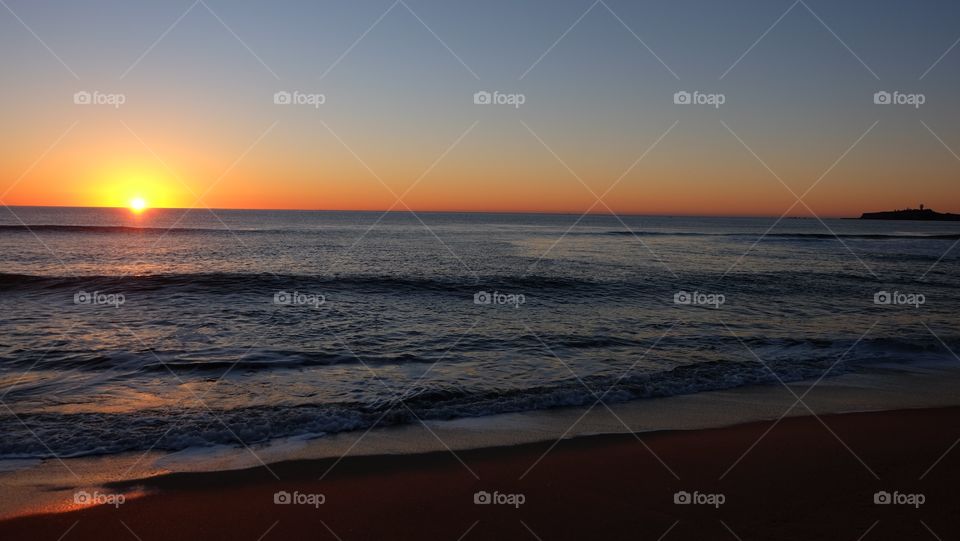 View of beach during sunset