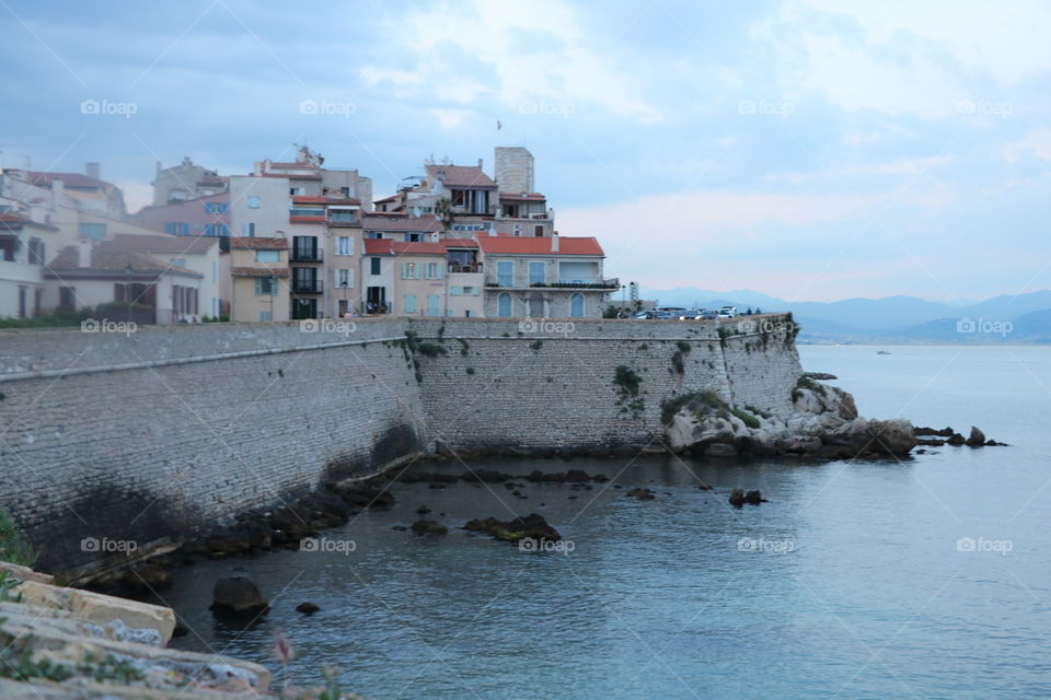 High stone wall surrounding the old town of Antibes 