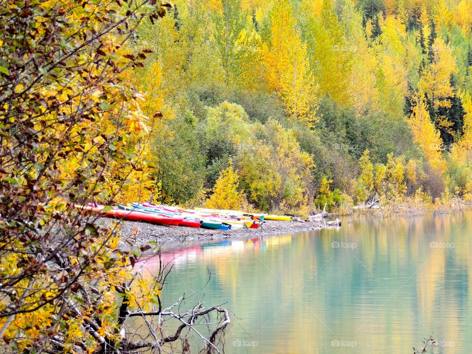 Alaska lake with reflection and canoes  