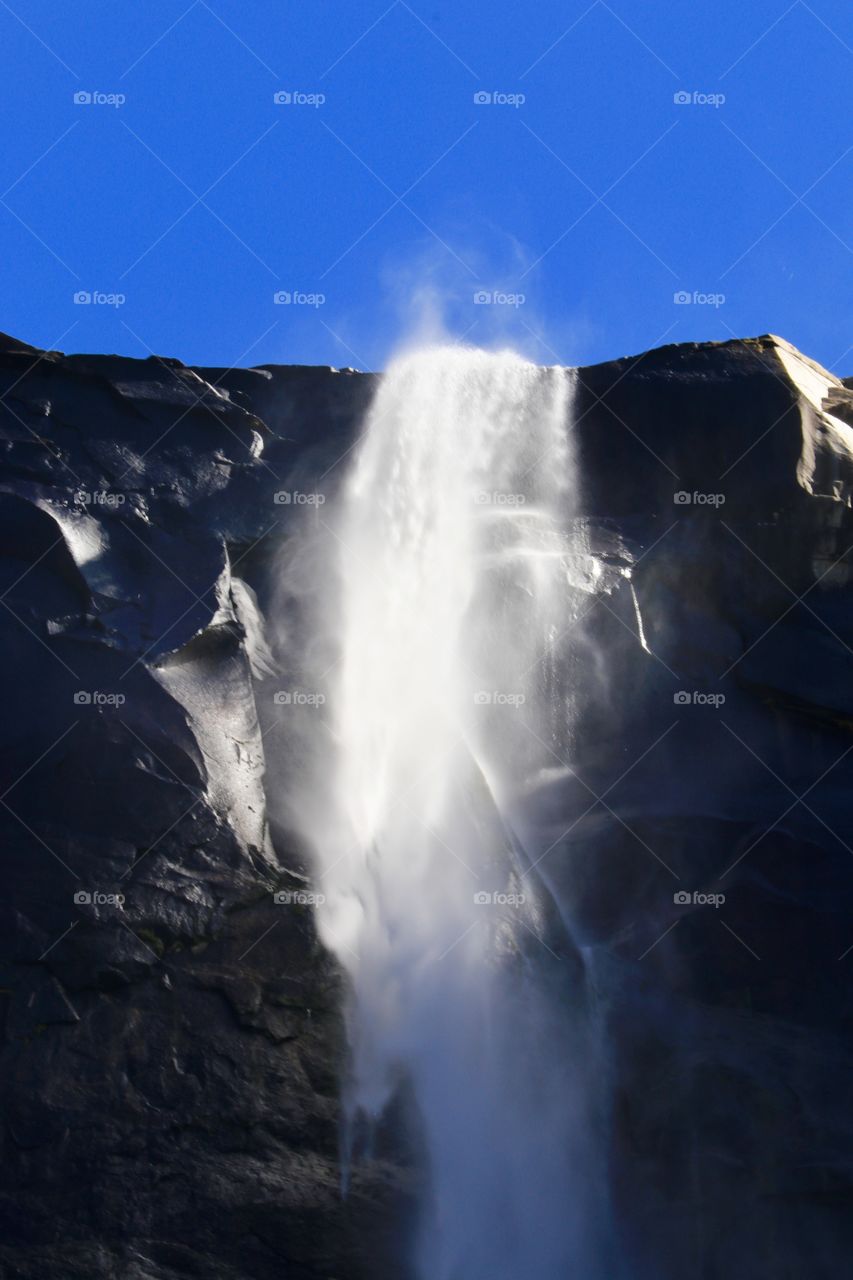 Cascading tumbling vernal waterfall in Yosemite National Park