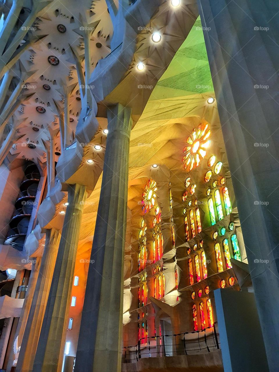 Explosion of colours through the stained glasses of the Sagrada Familia basilica in Barcelona