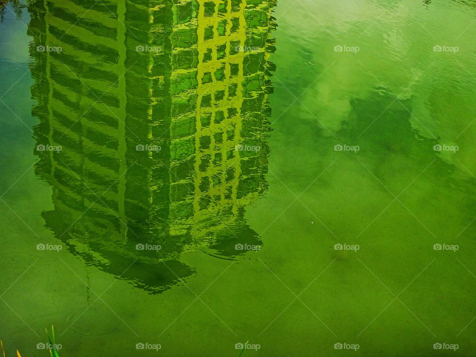 The reflection of the building on the lake