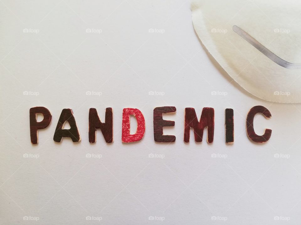 Written :"pandemic" and medical mask