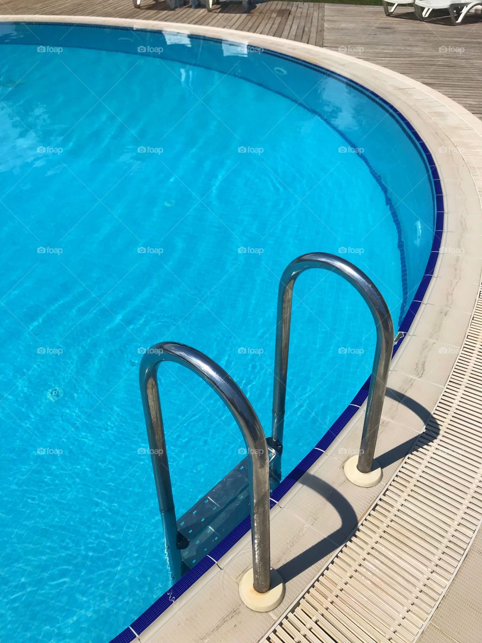sunbathe in blue pool