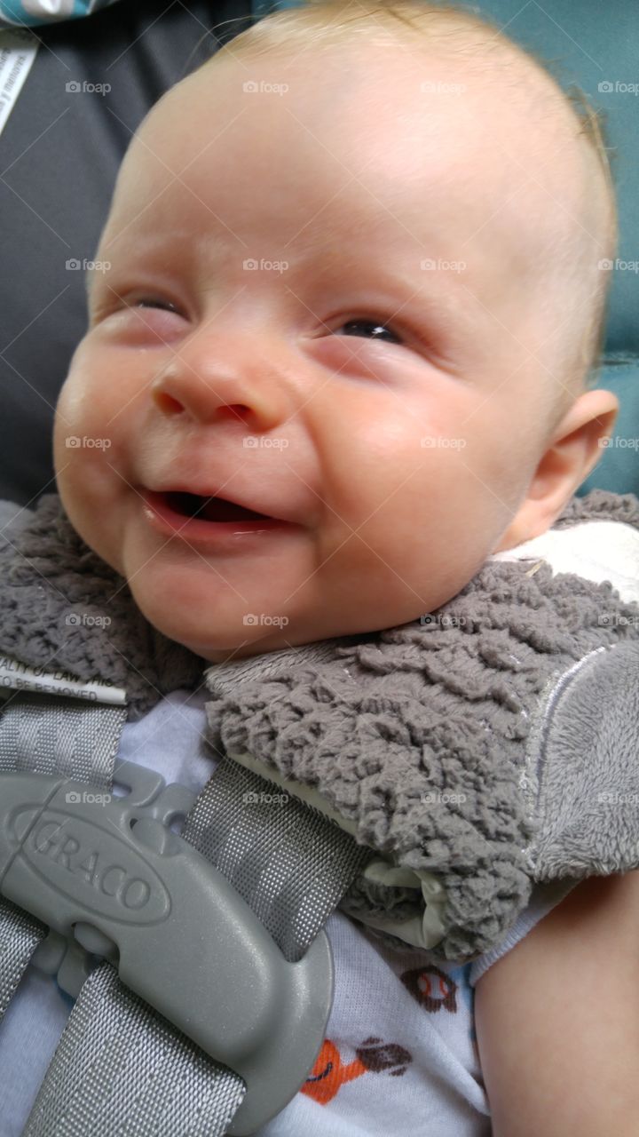 Happy Tymes in the car seat