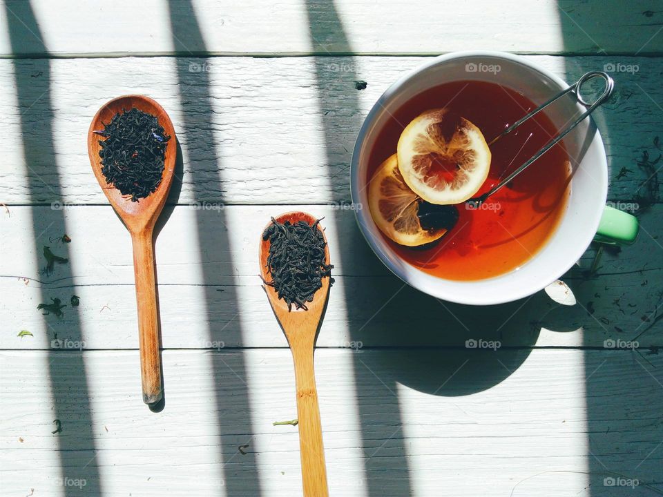 High angle view of tea with lemon