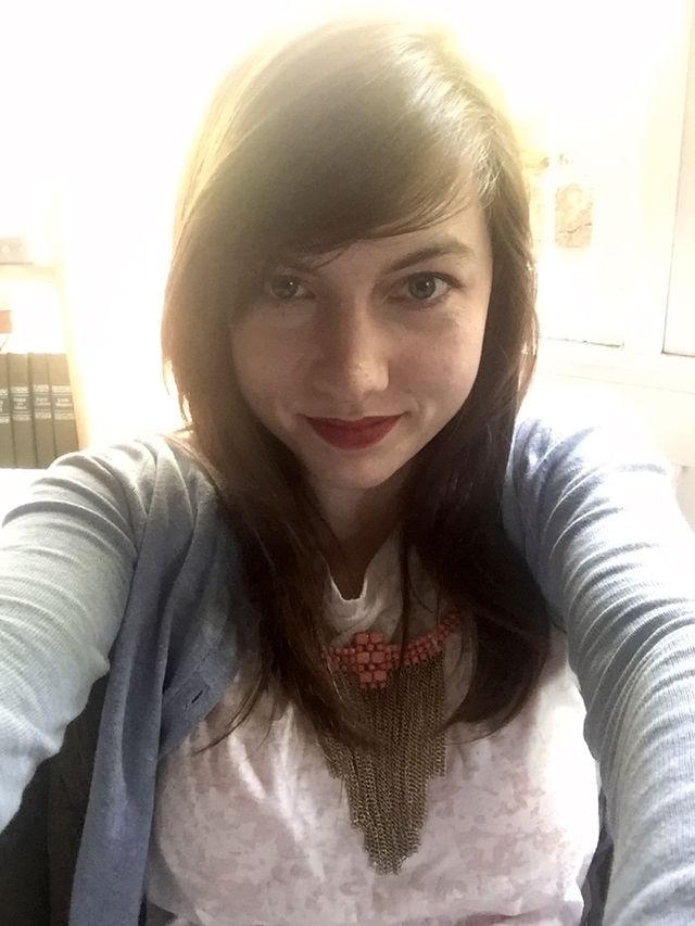 Feeling my selfie taken at the Summit hotel in Manitou springs Colorado. I am 20, have long brown hair with grown out bangs, blue eyes, a fair complexion and red lips. 