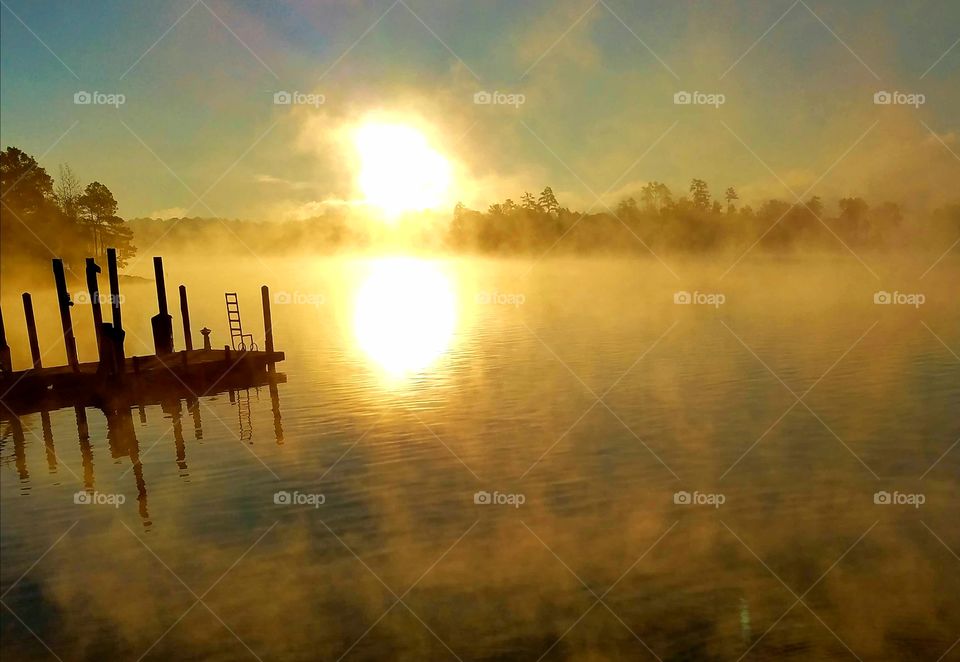 sunrise blurred by fog.