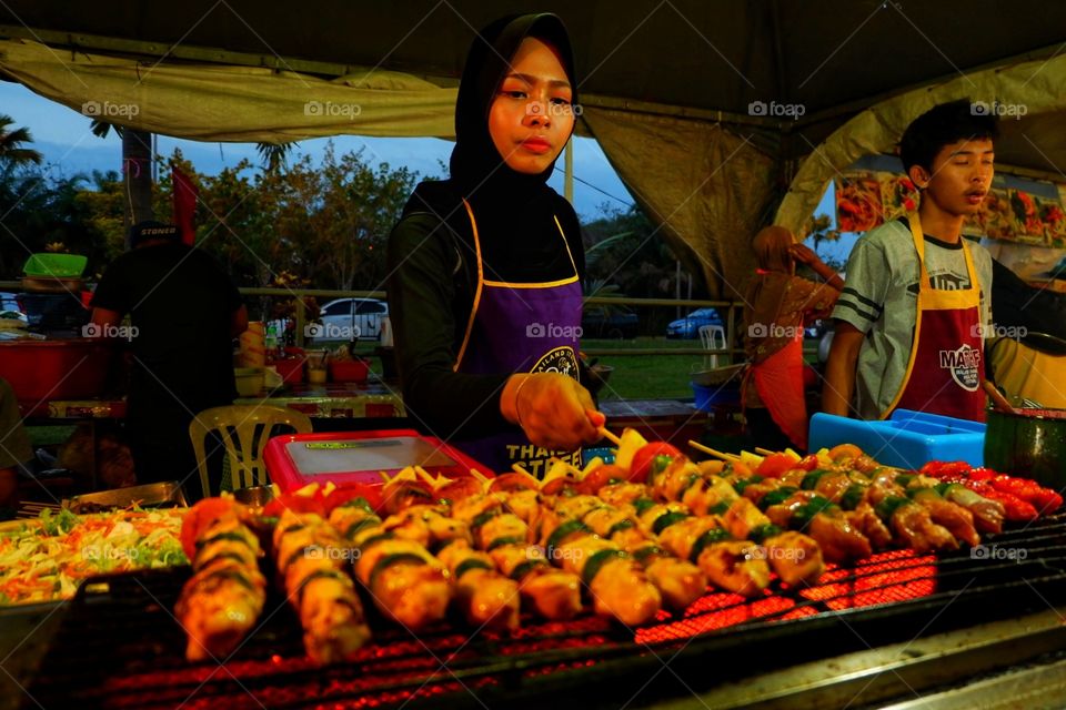 Tender grilled chicken kebabs and honeyed chicken wings served at Malaysian and Thailand Food Festival.