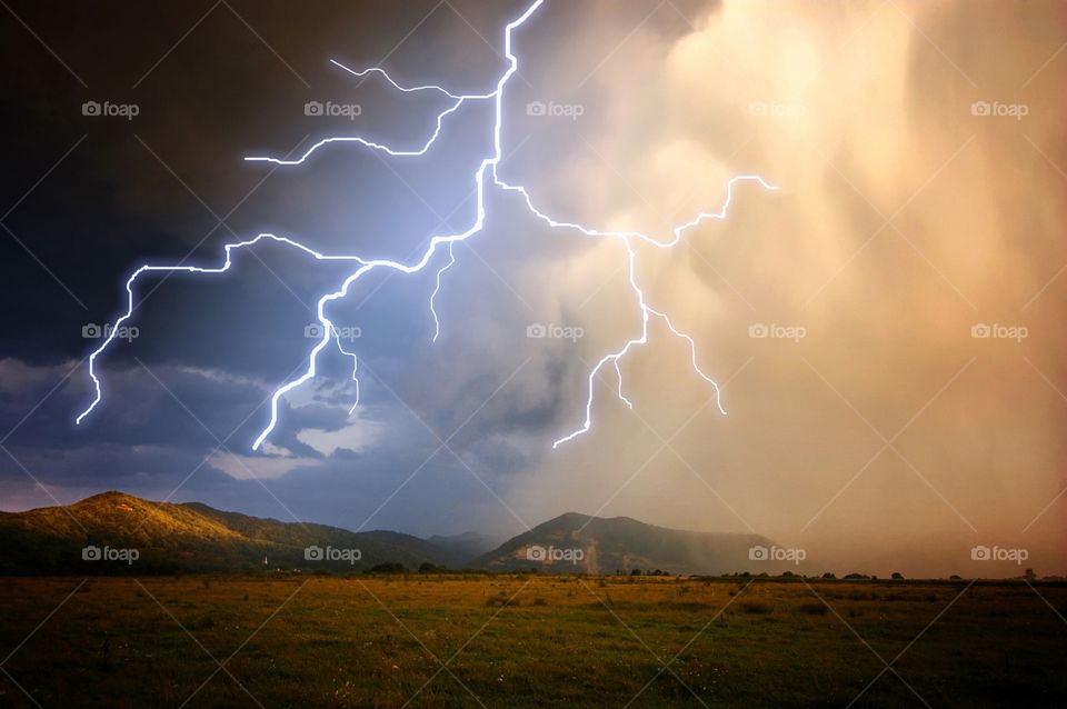 A Literally Ground-breaking Photo Of Lightning Smashing Into Some Sick Mountains,have a nice day.
