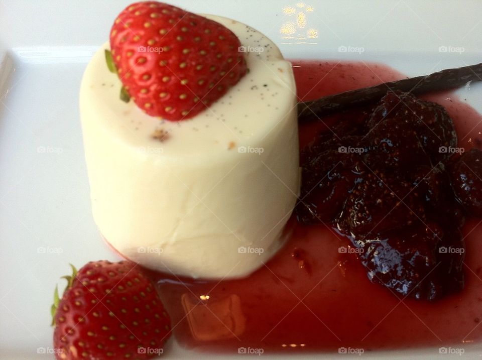 Panna cotta, italian baked cream with strawberries