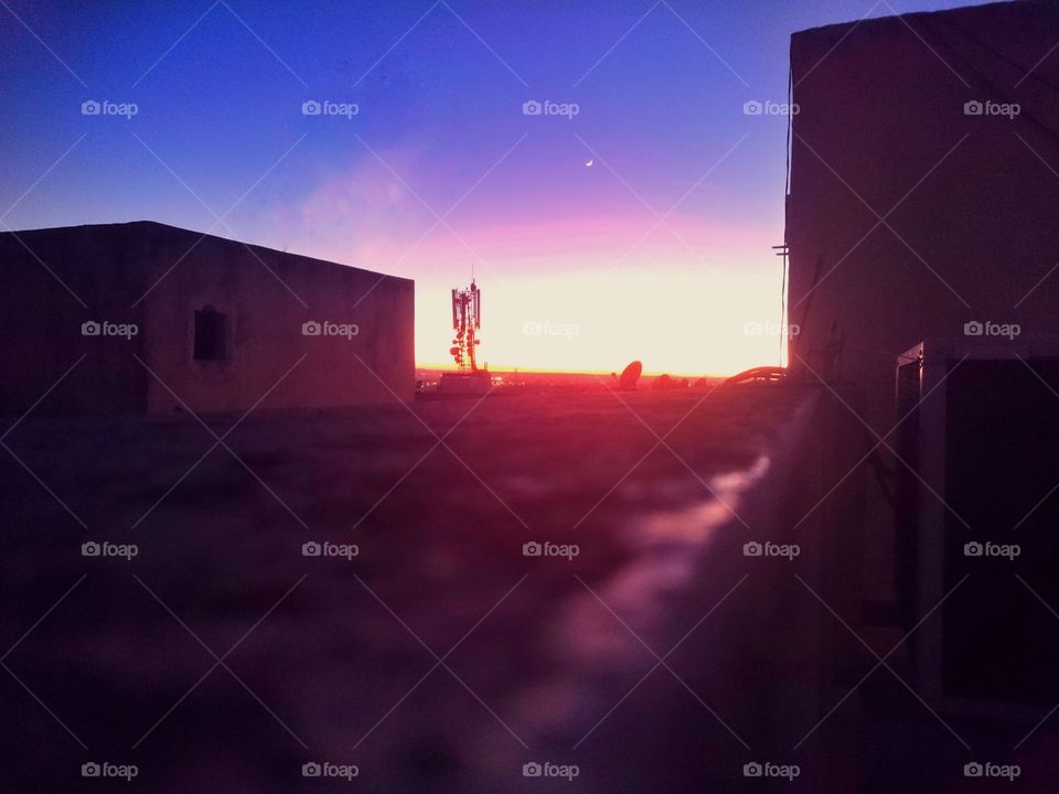 watching the sunset from a rooftop