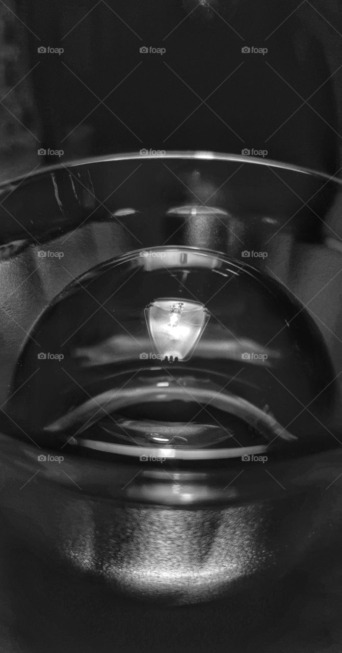 Reflections,  lights and shadows below a lamp