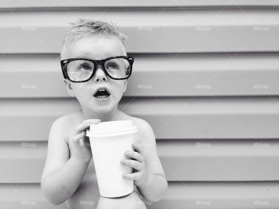 Hipster child and his coffee