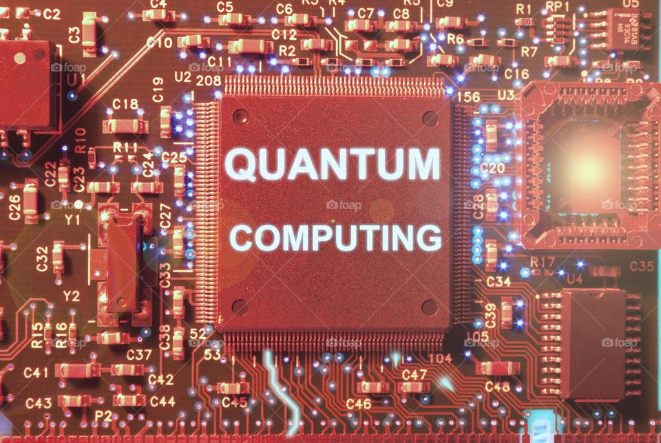 Quantum computing concept over a integrated circuit illuminated with red ligth
