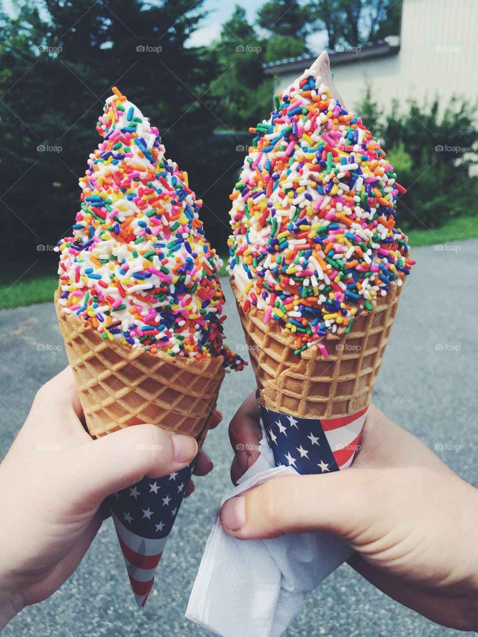 Hands holding delicious ice cream