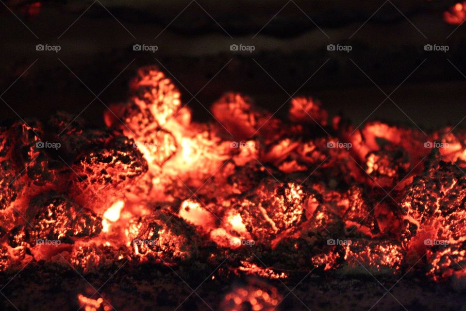 Hot coals from the fireplace. 