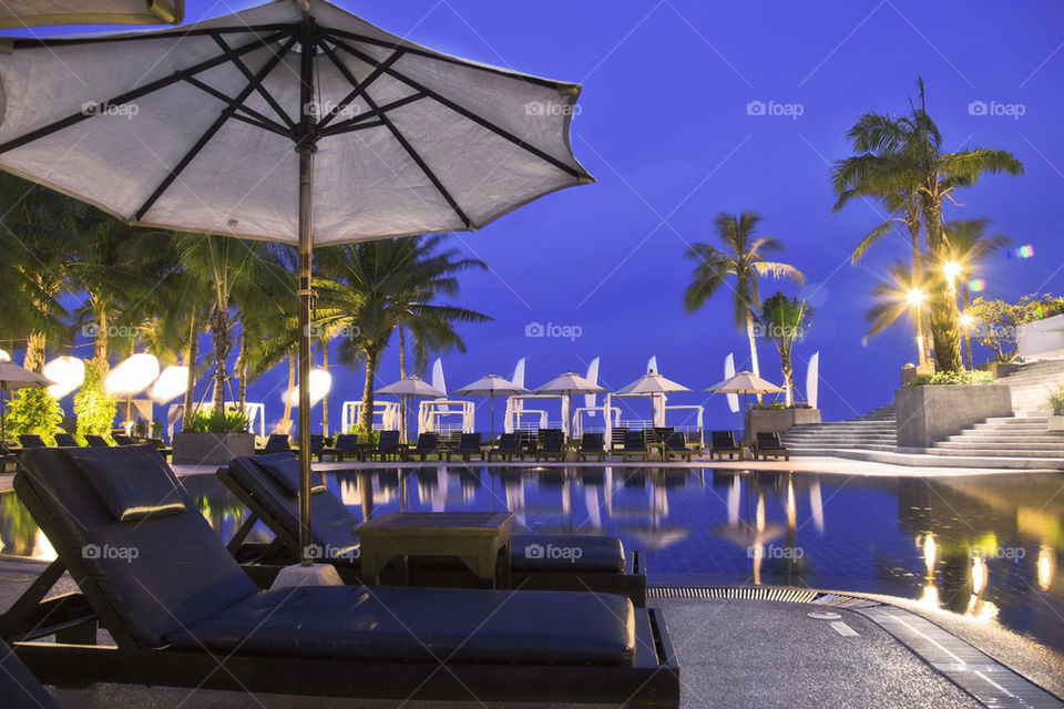 Hotel resort pool by night 