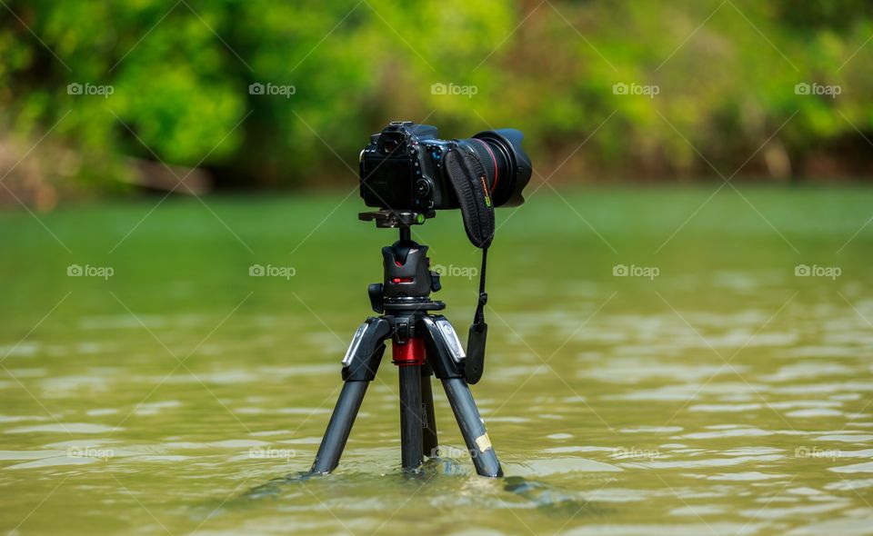 how far you can go to take that shot? canon on tripod inside sea water