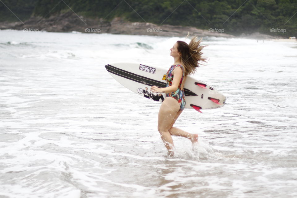 girl with a surfboard