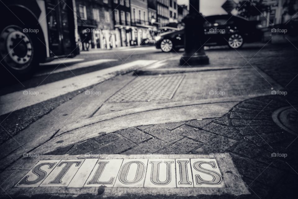 Along St Louis Street in the evening. French Quarter, New Orleans, Louisiana, USA. Monochrome version.