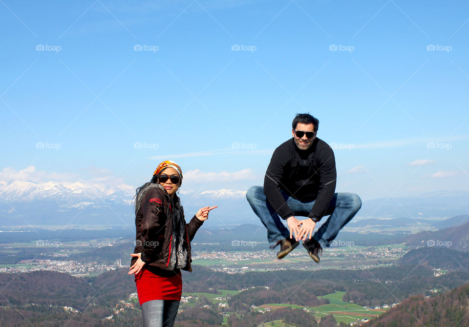 Young couple in front of mountain