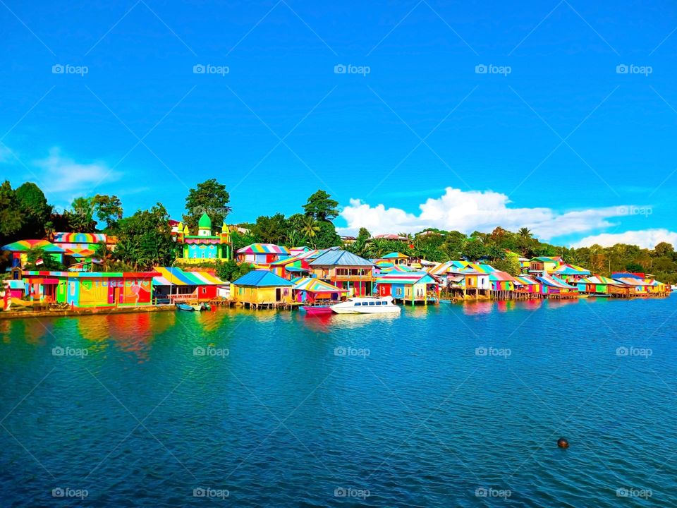 Beautiful view of rainbow village with blue beach