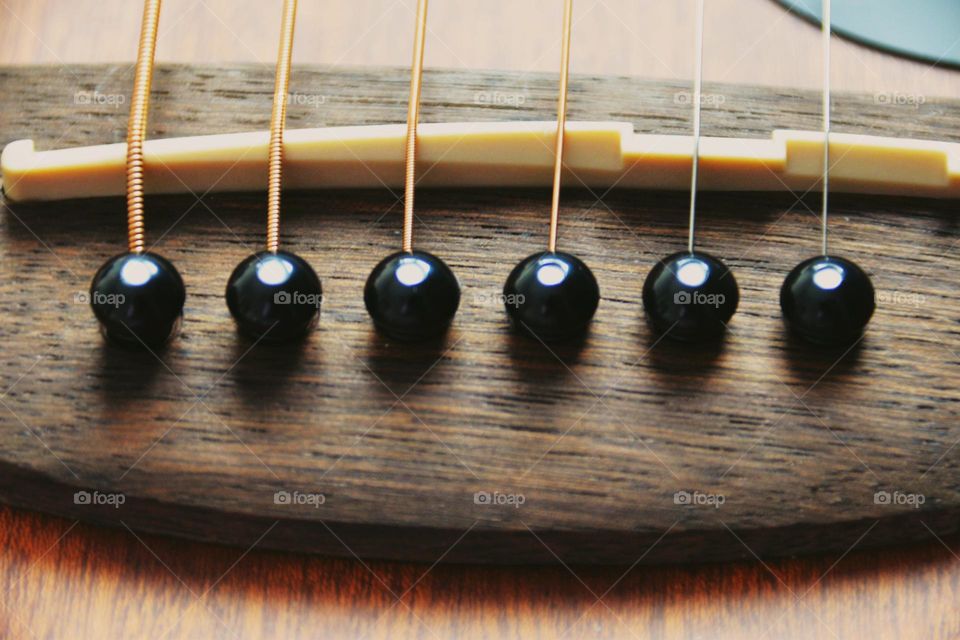 stings of a guitar very near