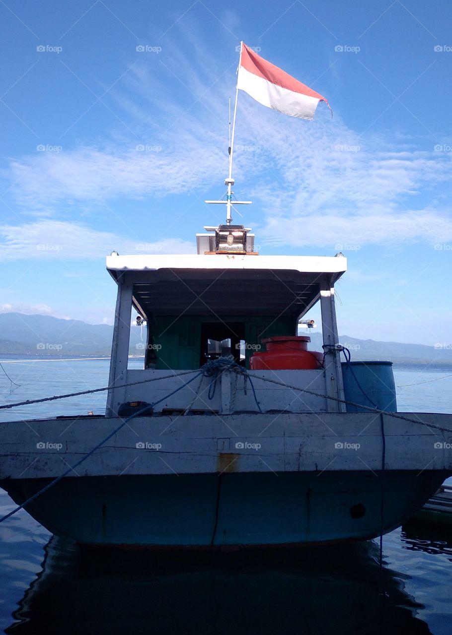 fishing boat docked at the dock