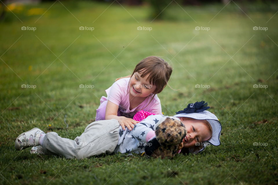 Little sisters in park