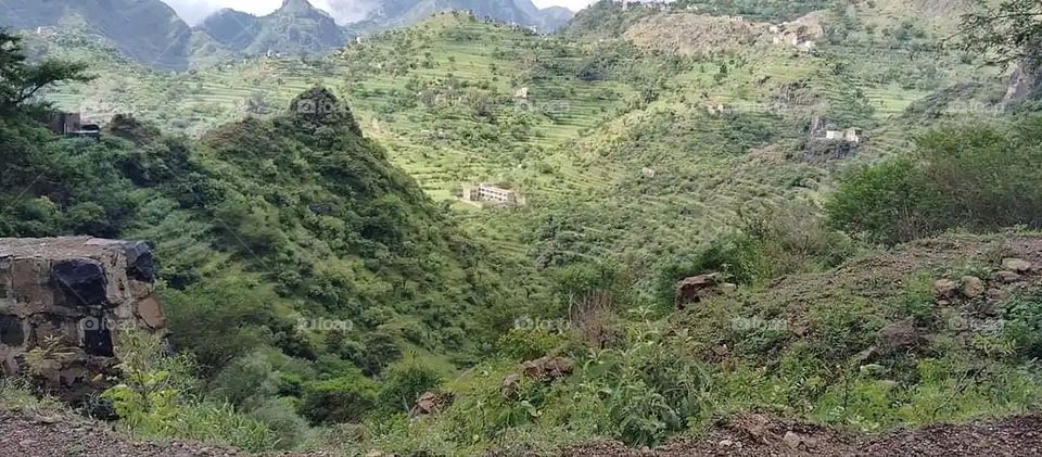 Glory be to God, the magnificent and picturesque view and the natural green trees are a view that is nothing more wonderful than it