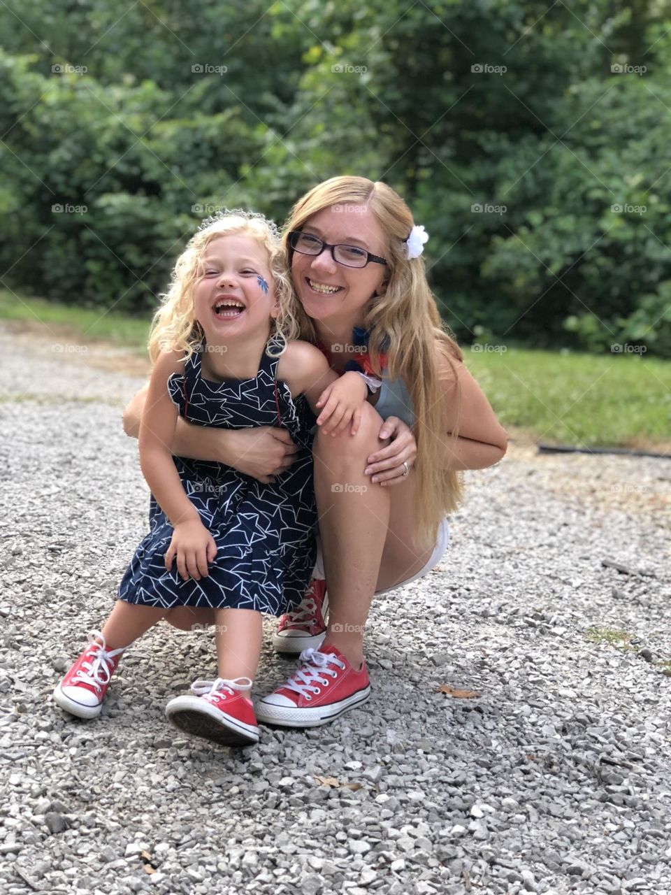 A mother and daughter celebrating the 4th of July 