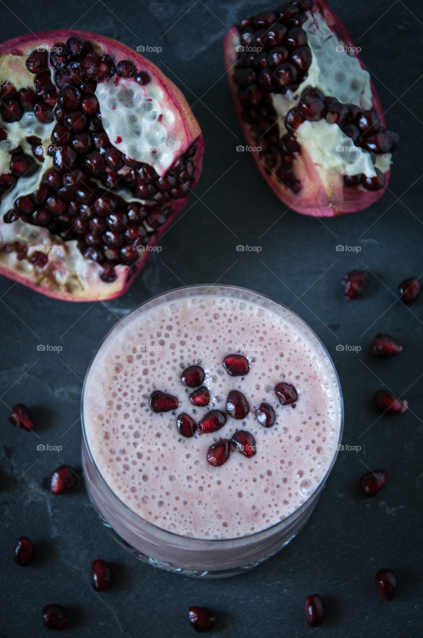 Yogurt, banana and pomegranate smoothie