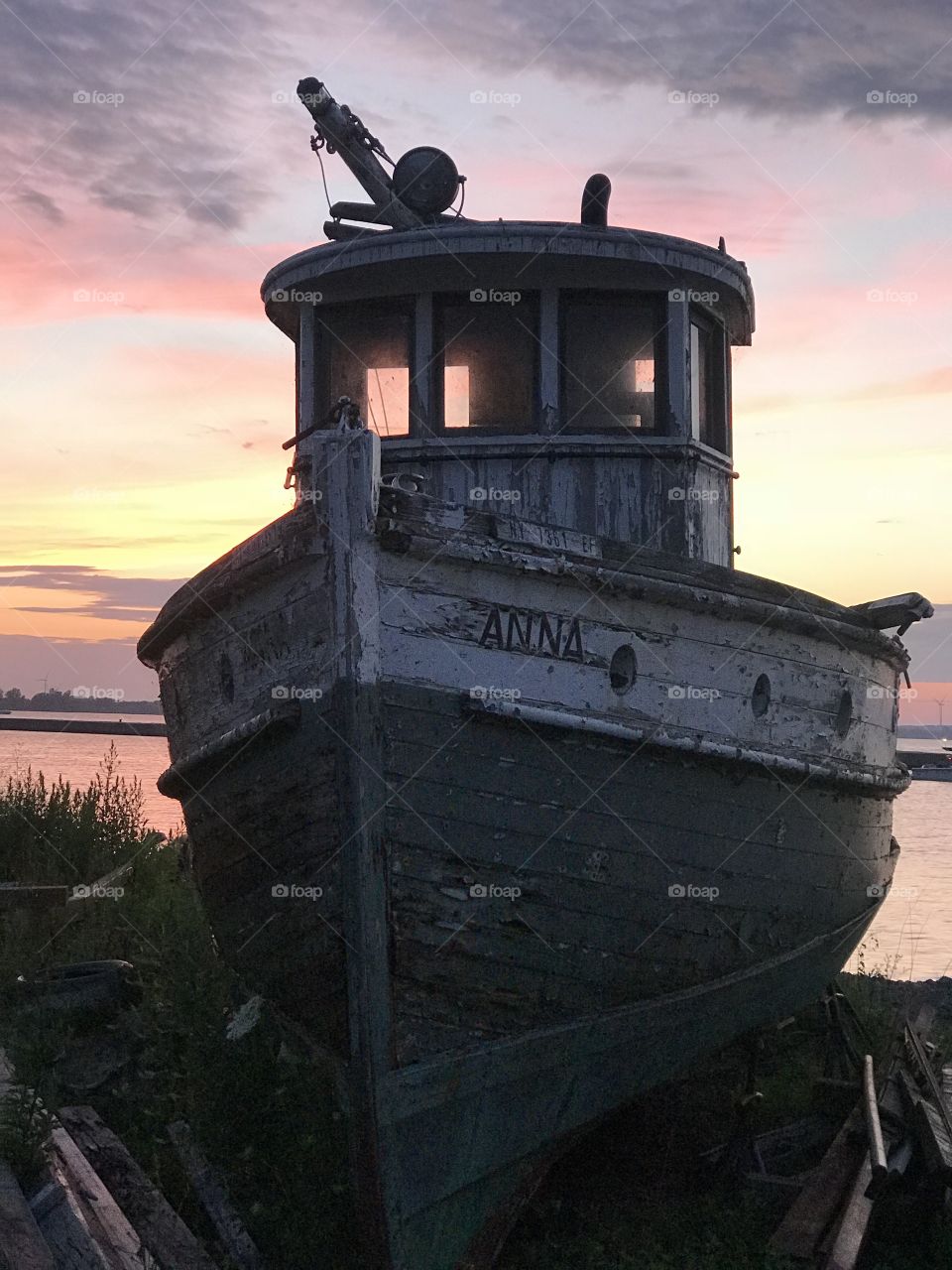 Abandoned Boat in Sunset
