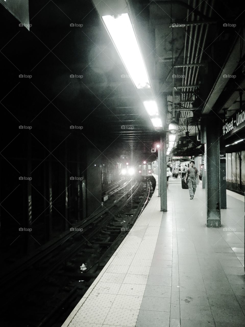 Arrival Underground. A scene in the New York Subway station