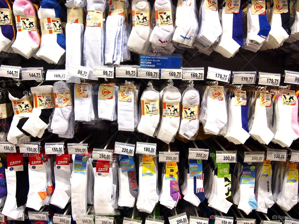 assorted socks on display at a store