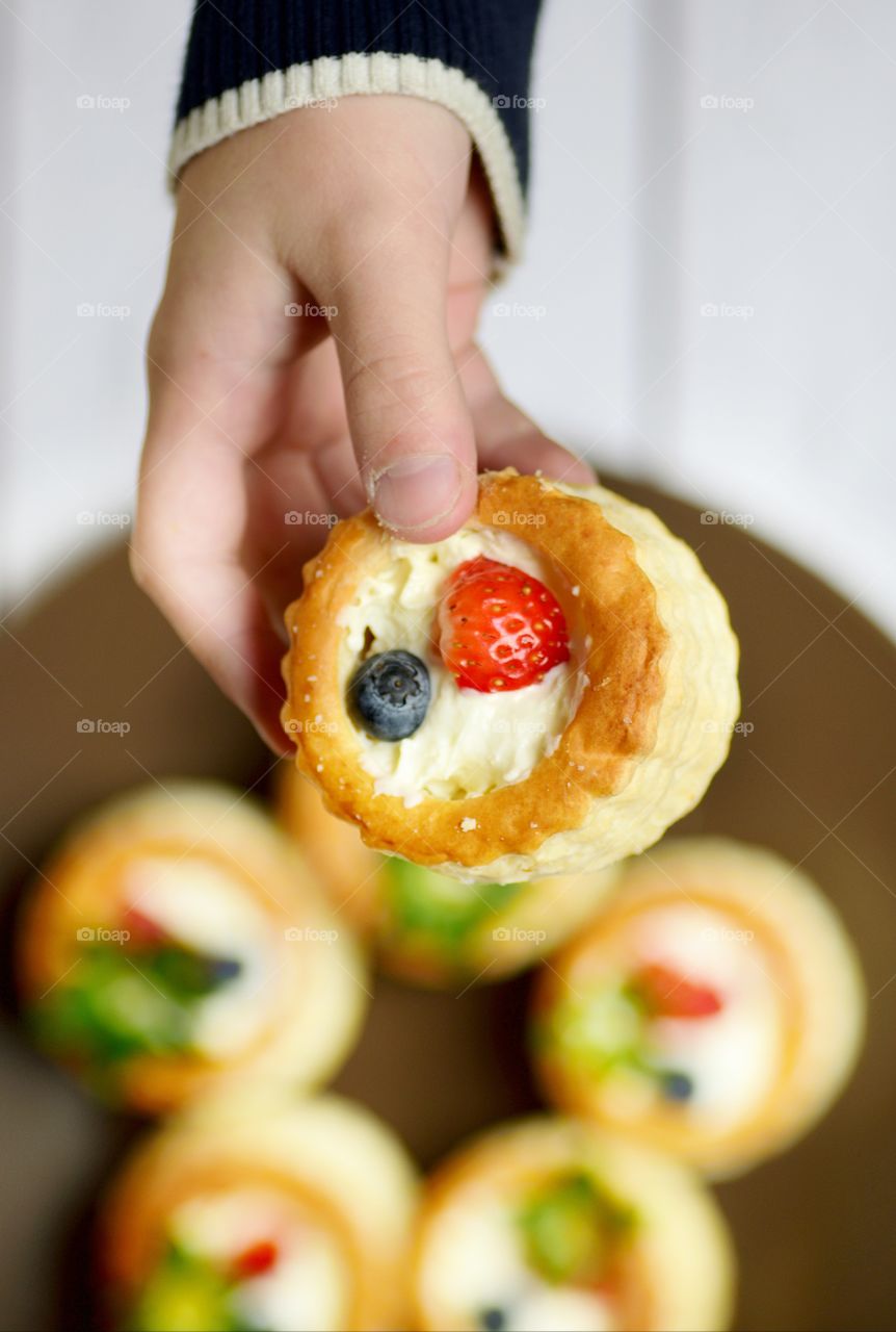 Close-up of hand holding sweetfood