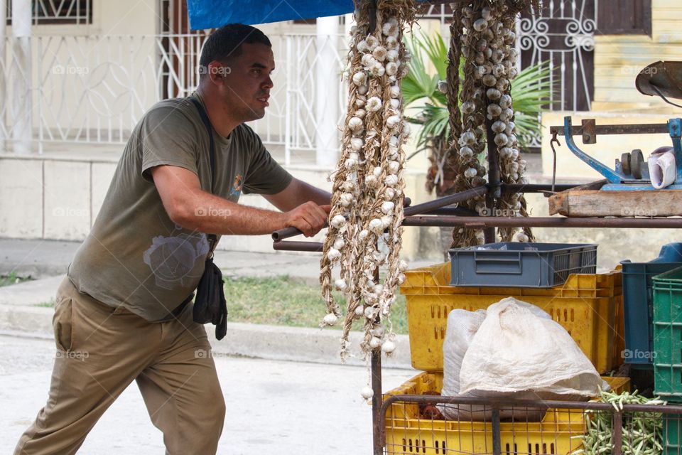 Cuban People.Street vendor selling produce.