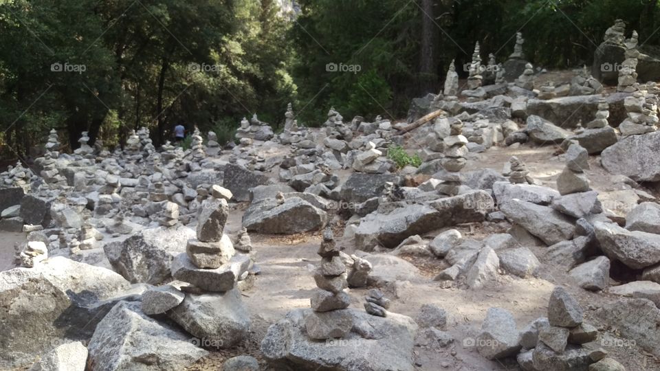 hundreds of hoodoos stacks of granite rocks trail markers in Yosemite valley