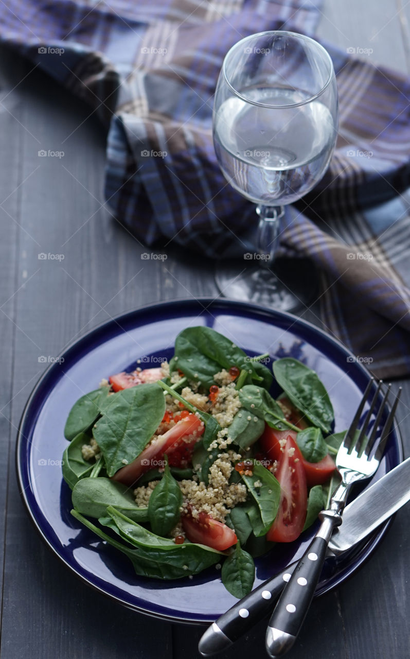 Healthy green salad with quinoa