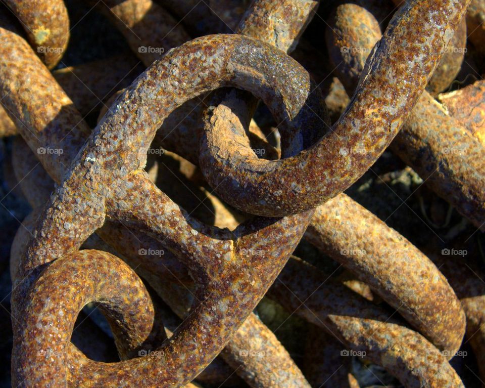 Heap of rusty anchor chain