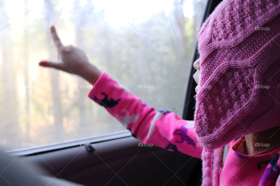 Child taking a ride in a car