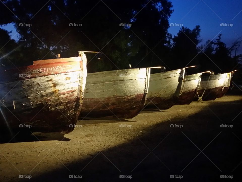 Old wooden boats on the coast