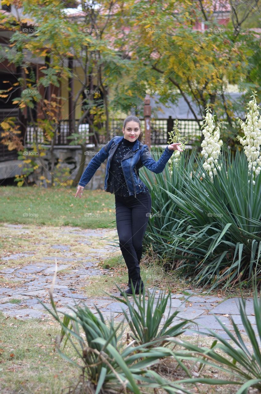 Beautiful Young Girl Dancing Outside in Nature