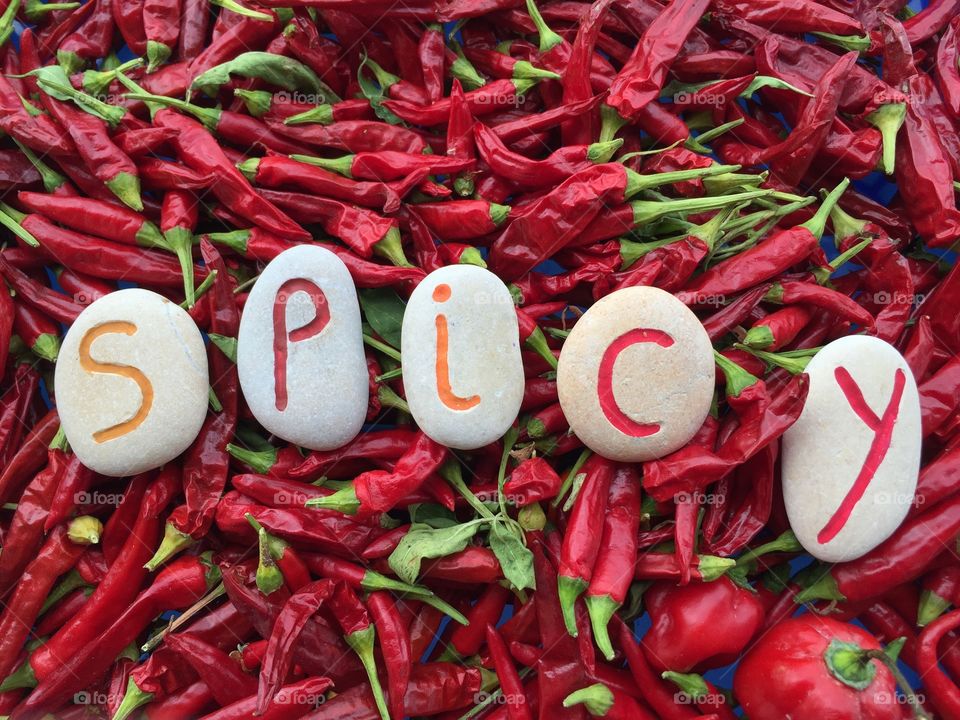 Red chili with spicy text