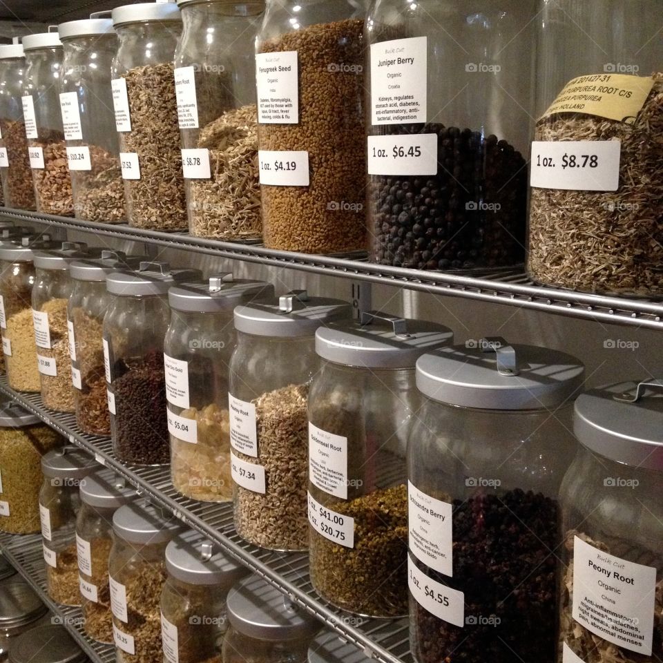 Spice rack. Jars of spices, herbs & teas