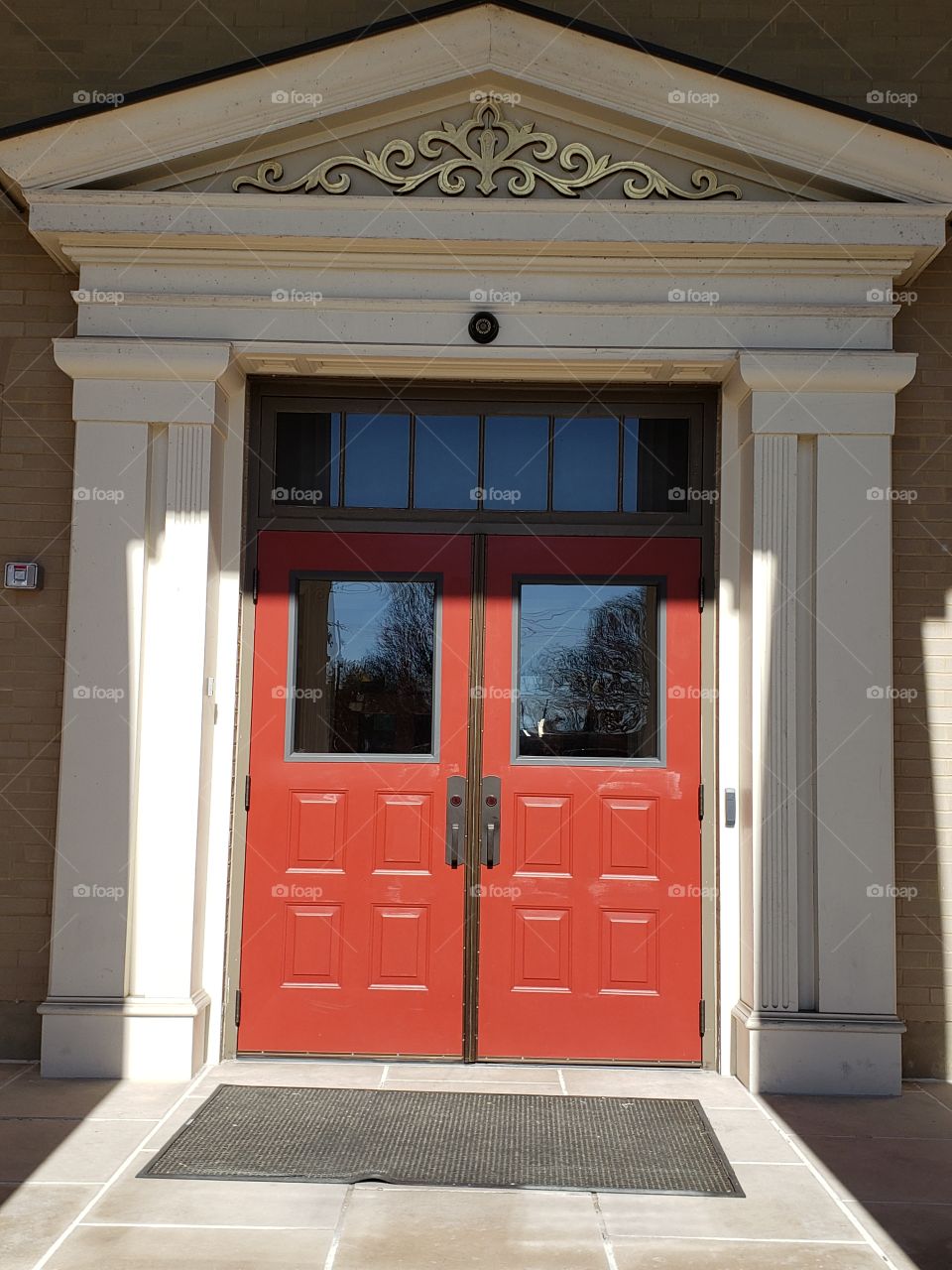 Red double door with transom window