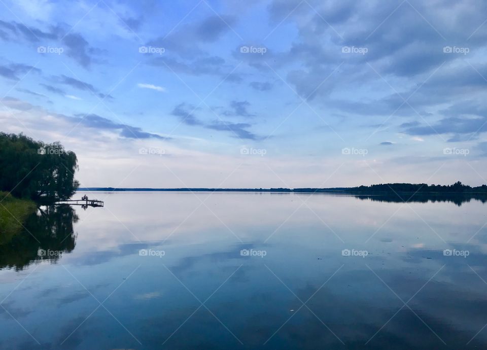 Beautiful lake and amazing blue sky. Like a mirror 