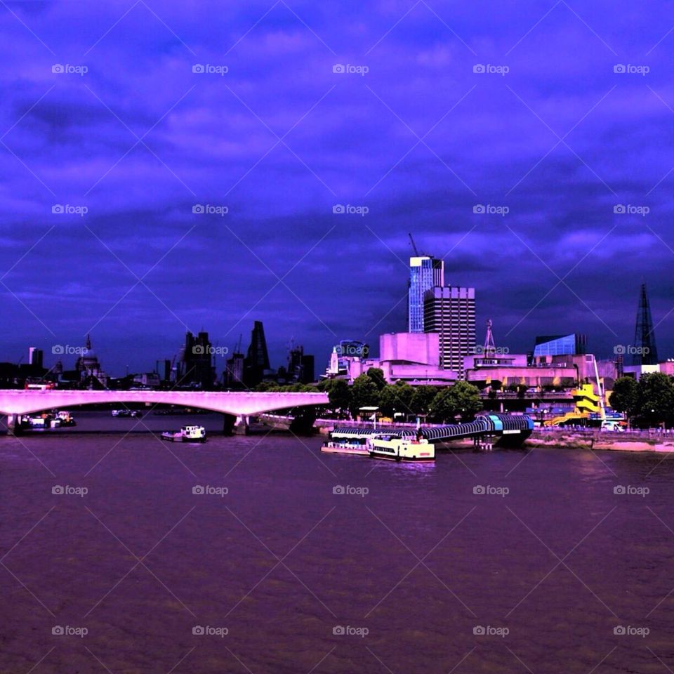 Moody storm clouds over Waterloo Bridge and the Southbank, London